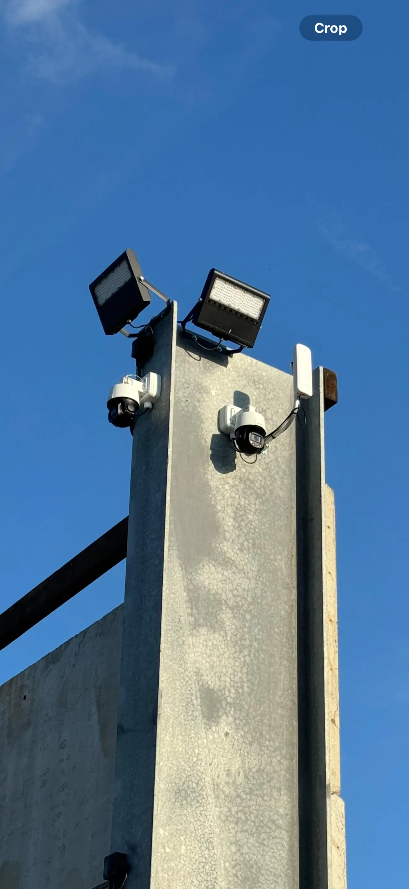 CCTV camera mounted on a steel column, installed by INET Fire & Security